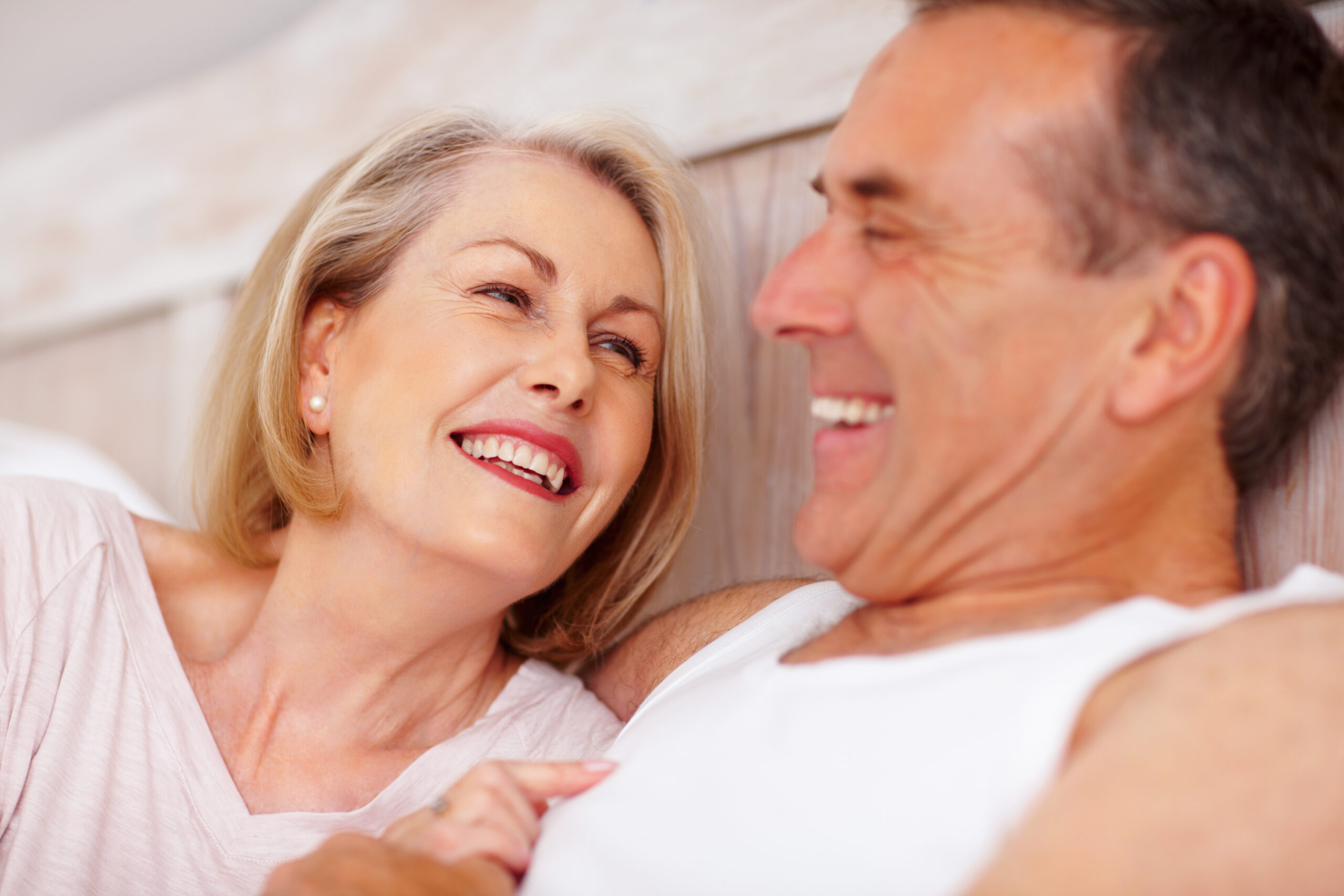 Romantic couple - Cheerful mature couple looking at each other.